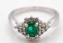 A Hallmarked 18ct White Gold Emerald & Diamond Ring