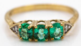 A Hallmarked 18ct Gold Emerald & Diamond Ring