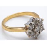 A Hallmarked 9ct Gold & Diamond Cluster Ring