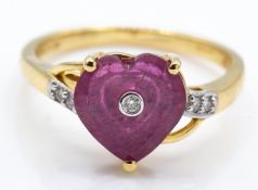 A Hallmarked Glenn Lehrer 9ct Gold Ruby & Diamond Torus Ring