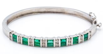 A 14ct White Gold Emerald & Diamond Hinged Bangle