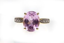 A Hallmarked 18ct Gold Kunzite & Diamond Ring