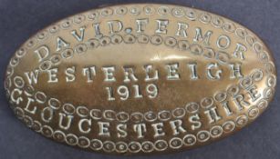 EARLY 20TH CENTURY BRASS TOBACCO TIN OF LOCAL INTEREST