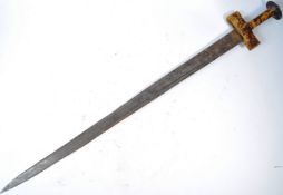 A 19TH CENTURY NIGERIAN TAKOUBA TRIBAL SWORD