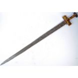 A 19TH CENTURY NIGERIAN TAKOUBA TRIBAL SWORD