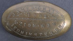 EARLY 20TH CENTURY BRASS TOBACCO TIN OF LOCAL INTEREST