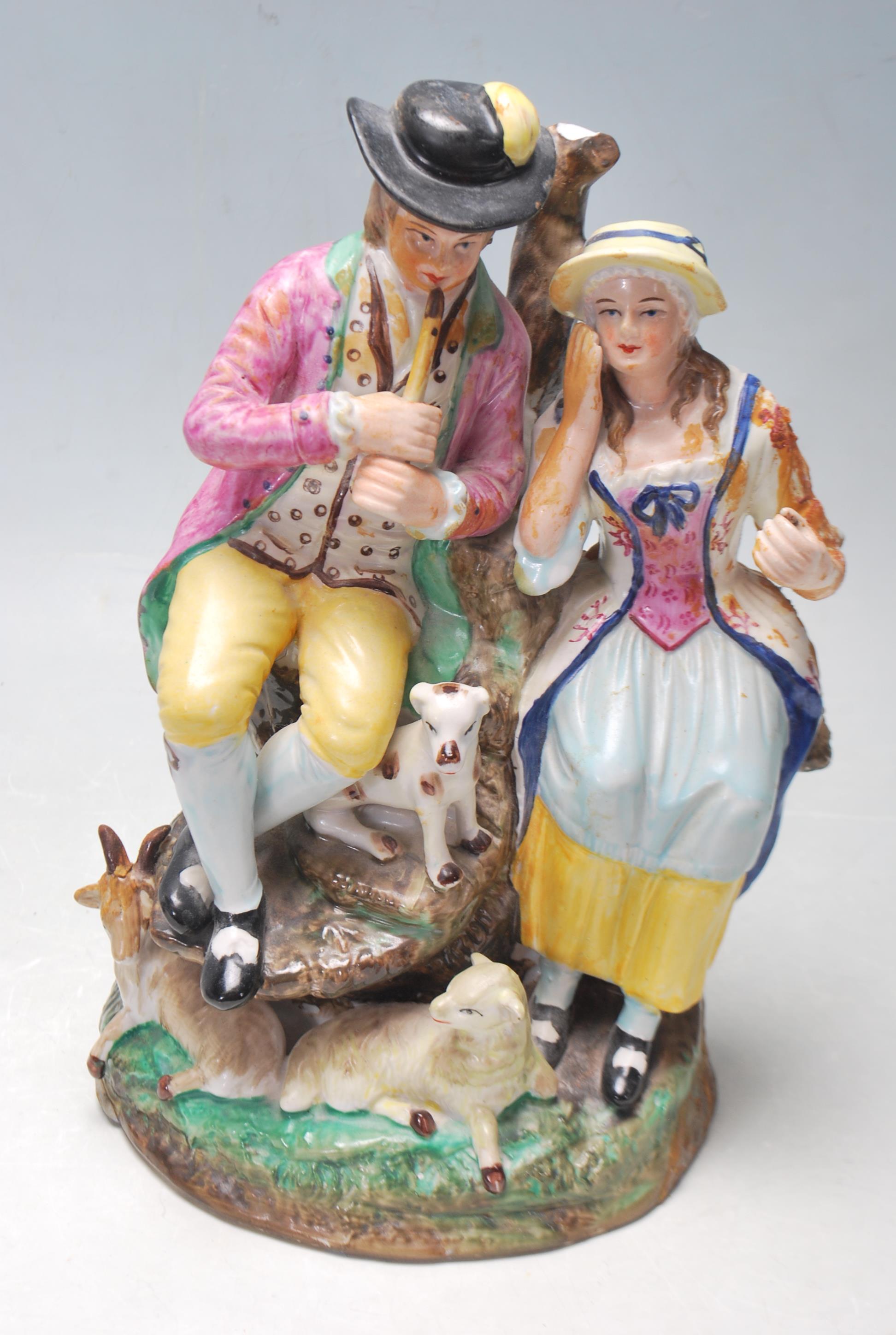 19TH CENTURY STATFORDSHIRE COUPLE