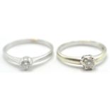 TWO 9CT WHITE GOLD DIAMOND SOLITAIRE RINGS