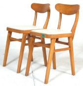 MID CENTURY DINING CHAIRS.