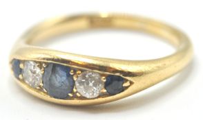 18CT GOLD RING SET WITH SAPPHIRES AND DIAMONDS
