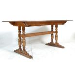 ERCOL LARGE DORCHESTER PATTERN ELM DINING TABLE