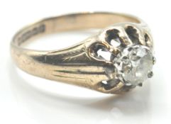 9CT GOLD AND DIAMOND CLAW SET RING