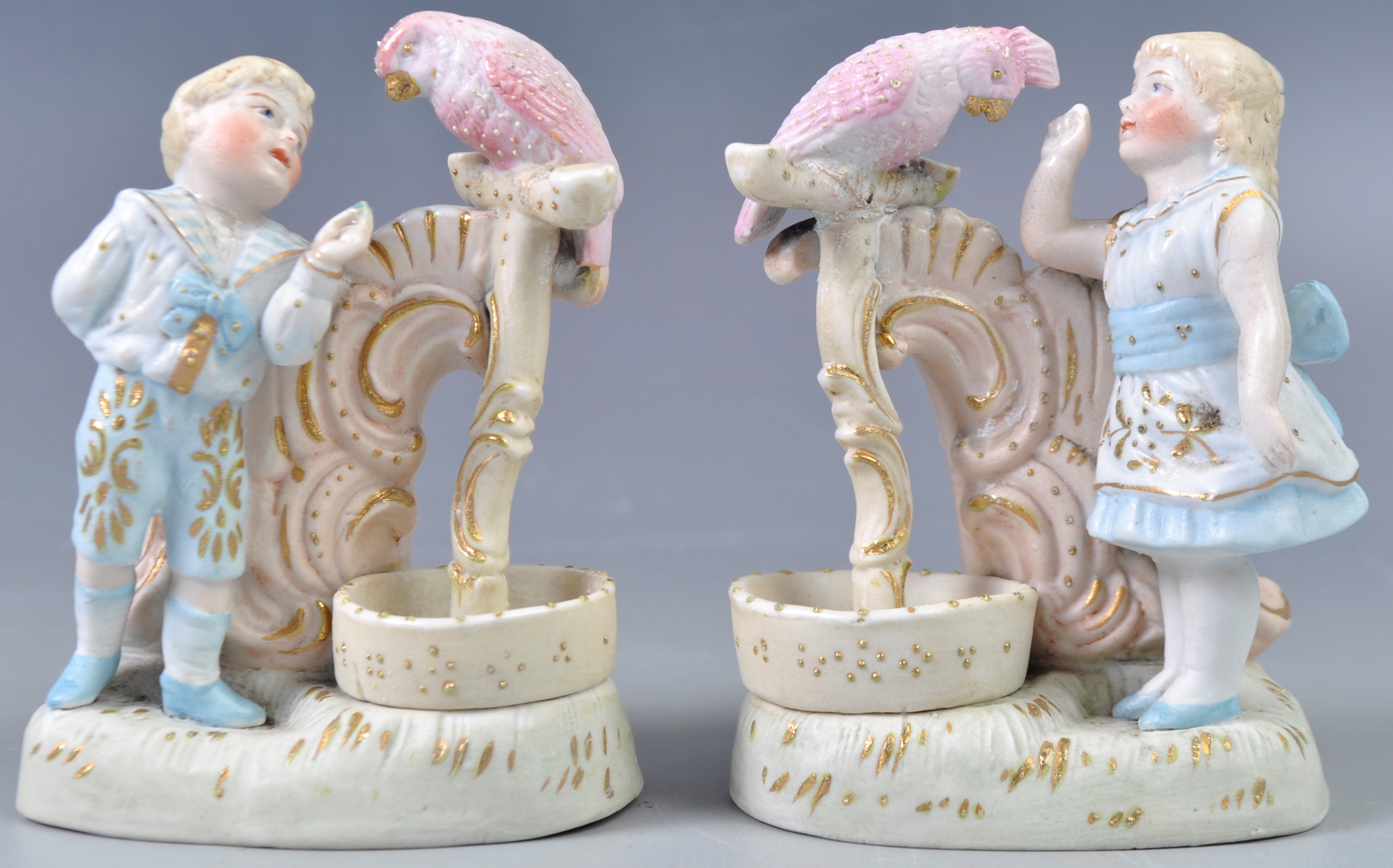 ANTIQUE PAIR OF BISCUIT PORCELAIN MATCH STRIKERS