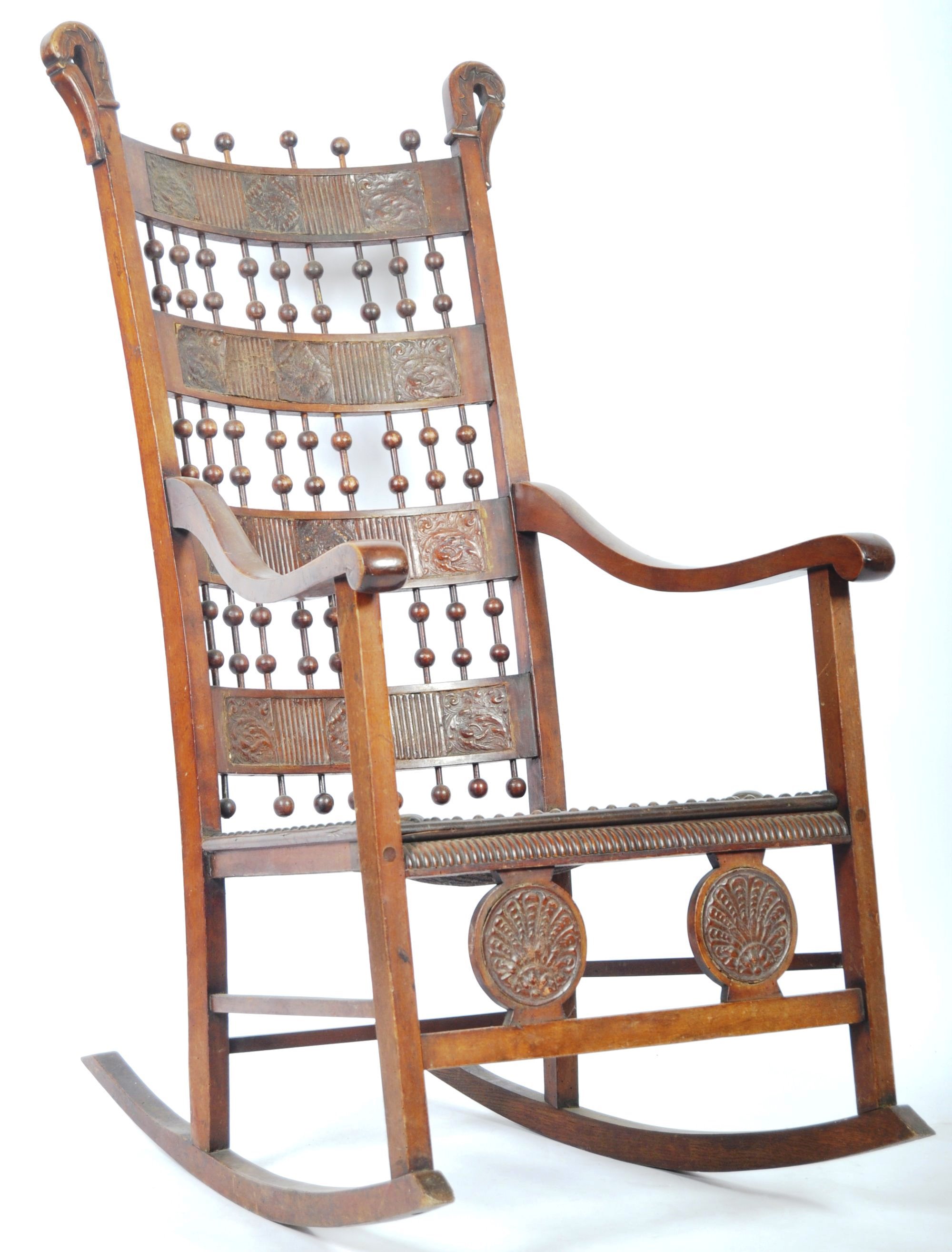 EARLY 20TH CENTURY ANTIQUE MAHOGANY AND LEATHER ROCKING CHAIR