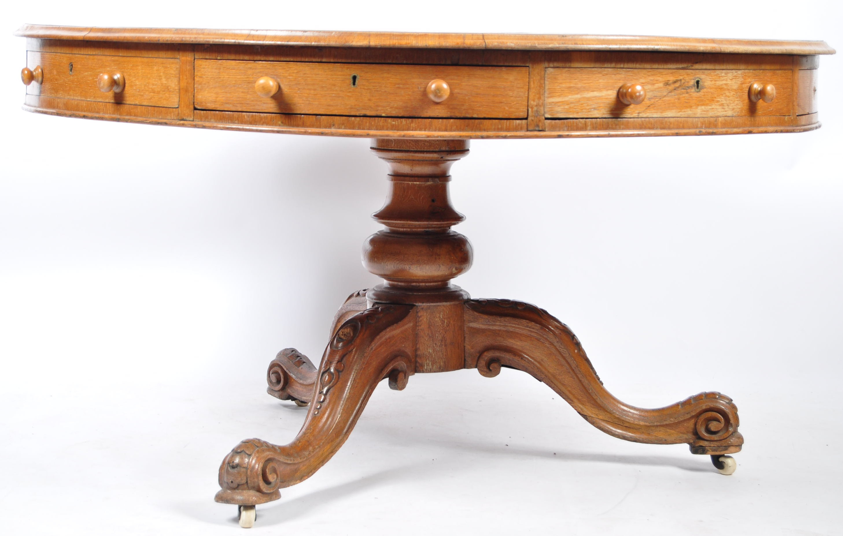 AN IMPRESSIVE 19TH CENTURY OAK DRUM DINING TBALE