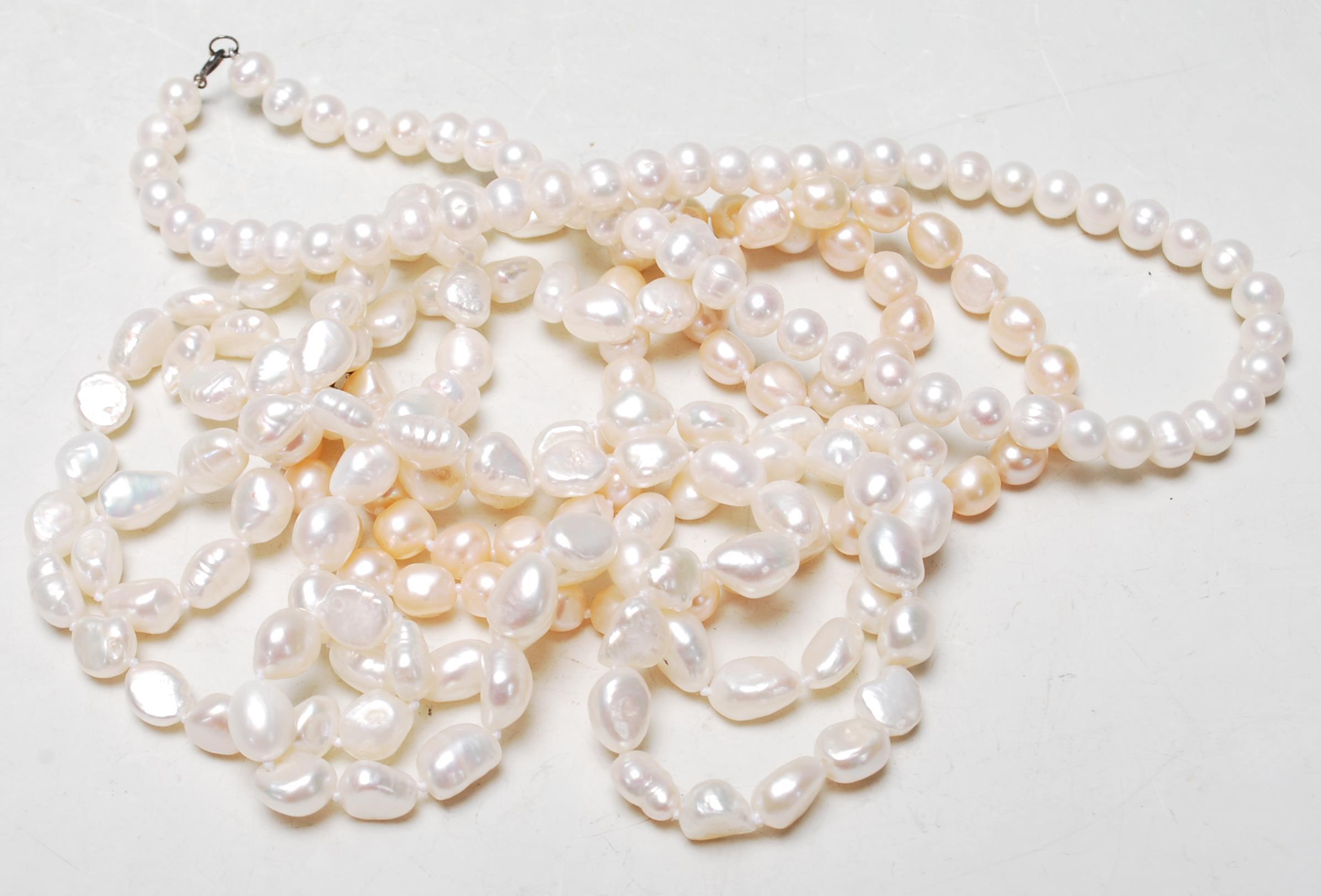 A GROUP OF THREE VINTAGE PEARL NECKLACES