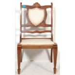 AN EARLY 20TH CENTURY EDWARDIAN MAHOGANY INLAID NURSERY CHAIR