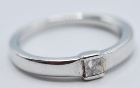 18CT WHITE GOLD AND DIAMOND RING