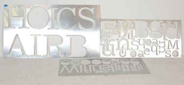 RETRO VINTAGE INDUSTRIAL LATE 20TH CENTURY METAL STENCILS IN VARIOUS TYPEFACES