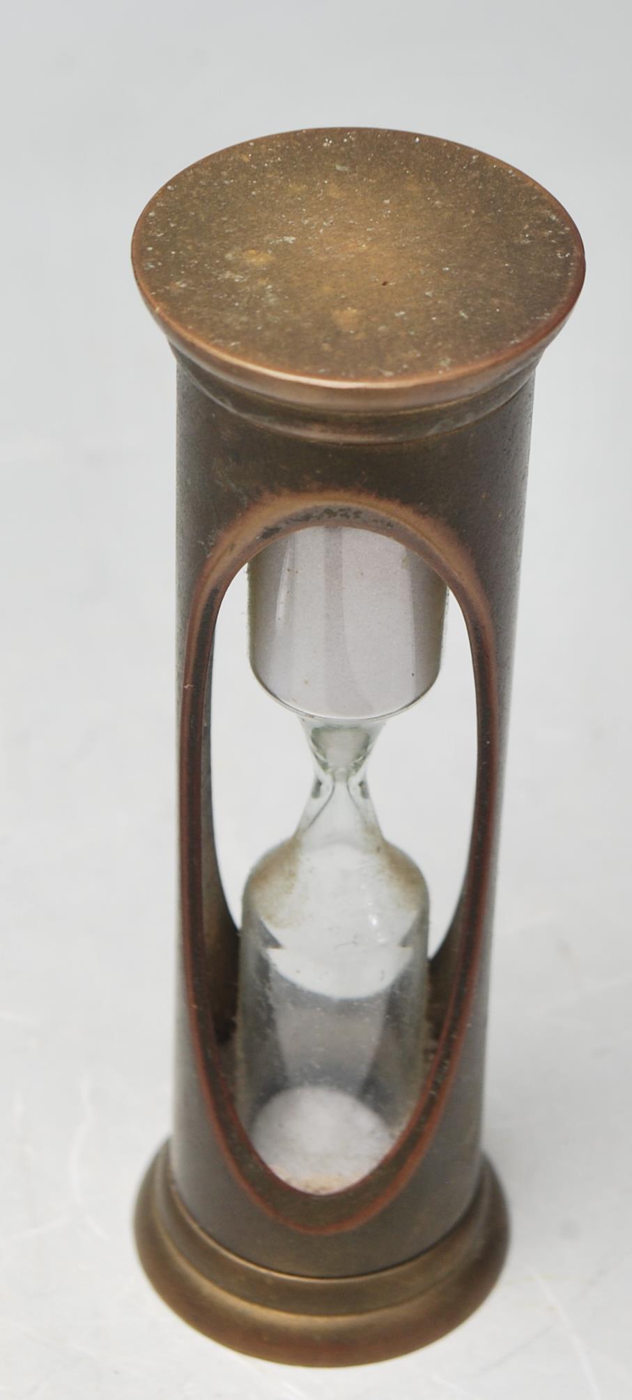 TWO 60 MINUTE STOPWATCHES - BRASS CLEPSYDRA - ANTIQUE CAN OPENER - Image 2 of 6