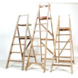 THREE VINTAGE 20TH CENTURY WOODEN STEP LADDER / A-FRAME LADDER