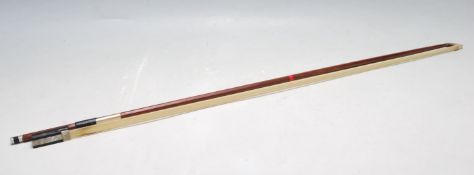 A 20TH CENTURY GERMAN NICKEL MOUNTED VIOLIN BOW BY G. WERNER