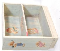 A RETRO VINTAGE 20TH CENTURY CHILDREN’S BOOKCASE WITH CARTOON BUNNIES DECORATION