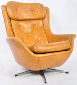 MID CENTURY MUSTARD YELLOW SWIVEL EGG ARMCHAIR