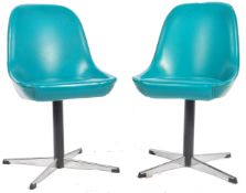 PAIR OF RETRO SWIVEL TUB / DINING CHAIRS UPHOLSTERED IN A TURQUOSIE VINYL