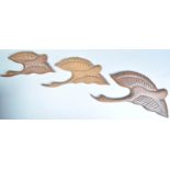 THREE MID CENTURY HAND CARVED TEAK WOOD FLYING DUCKS