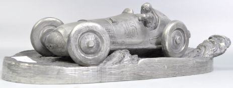 COMPULSION GALLERY PEWTER MODEL OF A 1930S RACE CAR