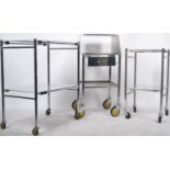 GROUP OF THREE STAINLESS STEEL DENTIST TROLLEYS