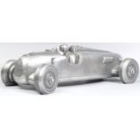 COMPULSION GALLERY PEWTER MODEL OF AN AUDIO RACE CAR