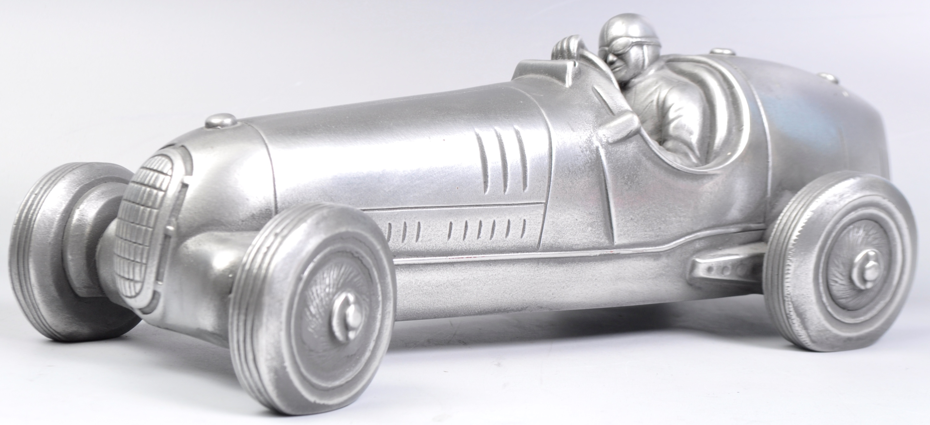 COMPULSION GALLERY PEWTER MODEL OF A 1930'S RACE CAR