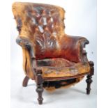 ANTIQUE VICTORIAN MAHOGANY AND BUTTON BACK LEATHER ARMCHAIR