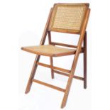 EARLY 20TH CENTURY FOLDING OAK CANE SIDE CHAIR