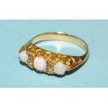 An 18ct yellow gold ring set three round opals, with pairs of 8/8-cut diamonds between, size O, 3.