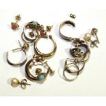 Ten pairs of 9ct gold and yellow metal earrings and ear studs, (one earring broken), 9.5g.