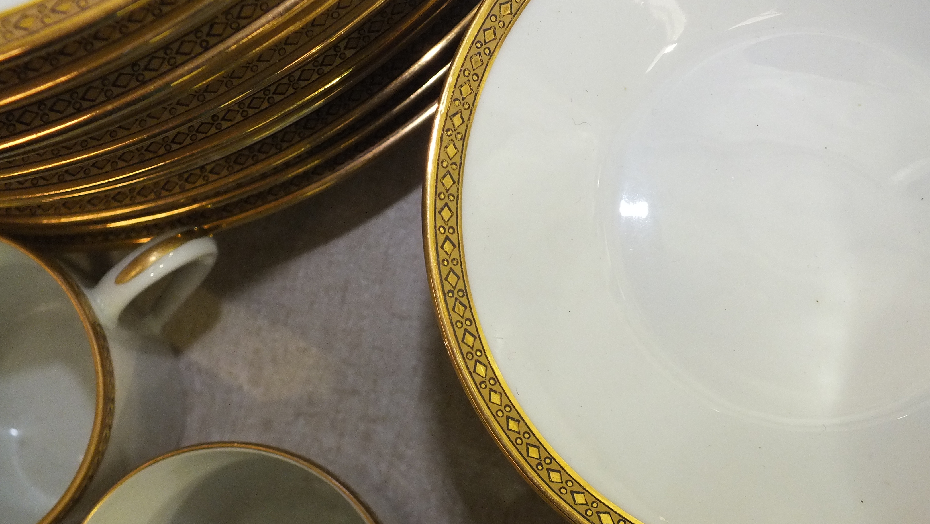 Eighty-seven pieces of Limoges dinner and coffee ware, of plain white ground with gilt-decorated - Image 4 of 6