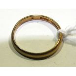 A 22ct gold wedding band, size J, 1.9g.