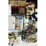 A quantity of costume jewellery and two jewellery boxes.