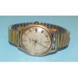 A gentleman's Longines Conquest automatic wrist watch with plated case, silvered dial, dart