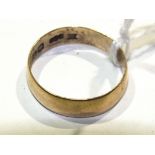 A 22ct gold wedding band, size N, 2.5g.