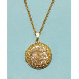 A 9ct gold engraved locket on chain, gross weight 7.7g.