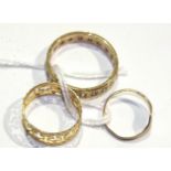 A 14ct gold pierced key pattern ring, size L, 1.1g, (damaged), a 9ct gold signet ring, etc.