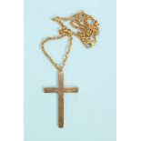 A large 9ct gold cross pendant, (53 x 32mm), on 9ct gold rope-link chain, 18.7g.