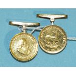 A pair of South Africa gold 1-Rand coins converted to cufflinks, 13.8g.