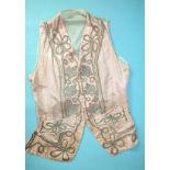 A late-18th century pale pink silk waistcoat, the front panels with applied silver lace and braid,