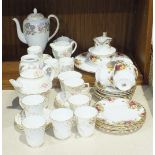 Fourteen pieces of Coalport teaware decorated with flowers on trellis, no.262926, (spout chipped