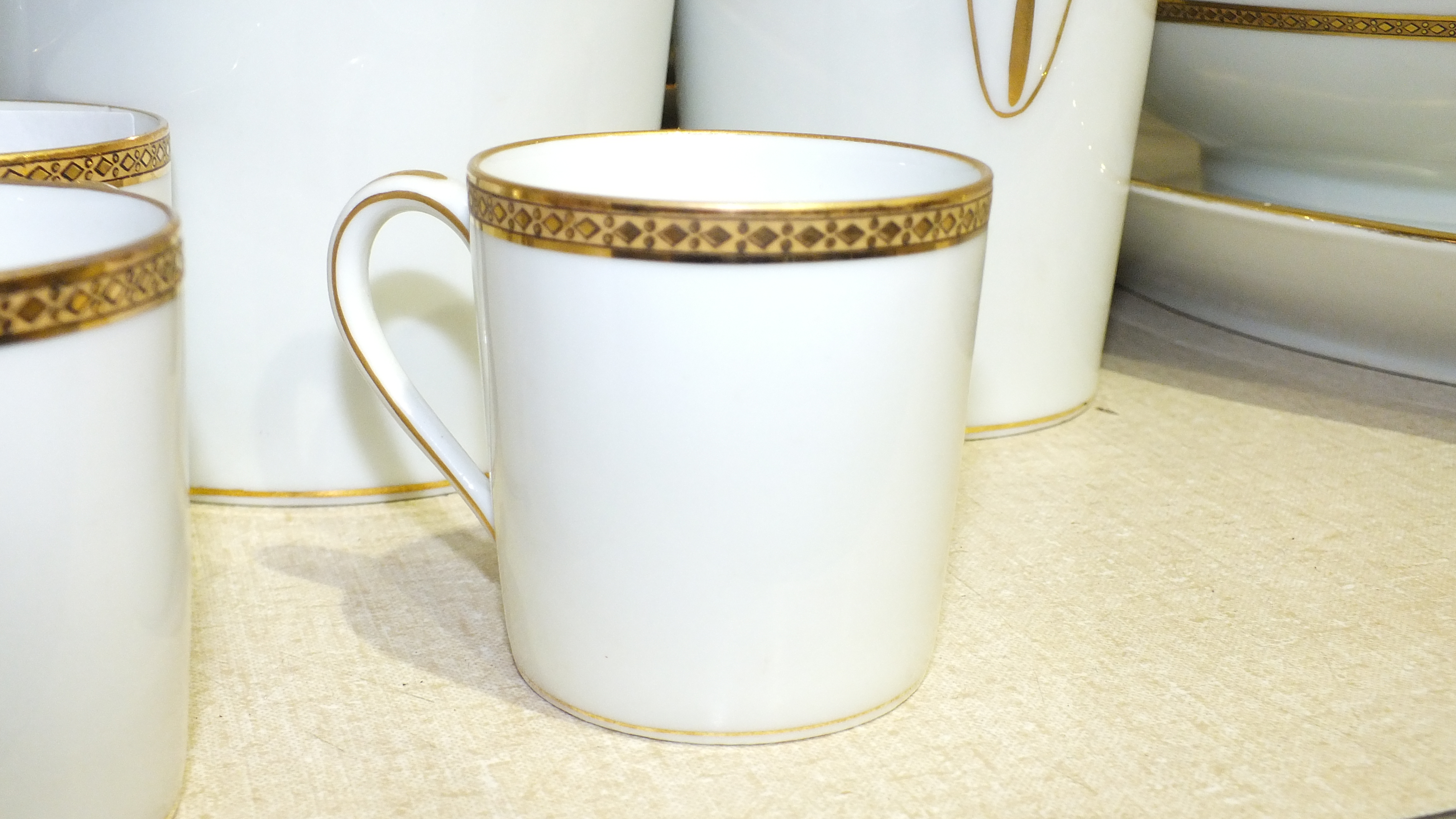 Eighty-seven pieces of Limoges dinner and coffee ware, of plain white ground with gilt-decorated - Image 5 of 6